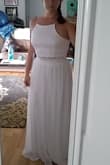 I've tried on many Lulus dresses and I've really been happy with the quality. I was considering this for my beach wedding dress, and may still!  It fit perfectly but I'm hoping to lose enough weight to order a medium instead. The picture doesn't do it justice! - Rachele A.