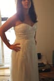 This is a more"traditional" style wedding dress. I think I need to have more on top to make it look great on me, but overall I was impressed with the quality and enjoyed the dress. There is one part I didn't like, the tulle is not sewn to the zipper on the back and kind of flaps. Other than that it's beautiful. - Rachele A.