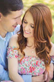 I'm in love with this dress. It was perfect for our 5 year anniversary photos. 
So flattering and the floral print is beautiful. I get so many compliments on this dress. Even though I'm only 5'3, the dress was a good "midi" length. - Kelly S.