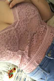 I was very upset that it didn't fit like everyone else's reviews said. 
No support for the breasts and it rises up and the cup area sits in the half top on my boob. I tried using a sticky push up bra but it still rises up. Don't recommend for peoples other heavy breasts. It looks great on other people but just not for me:( sucks cause it's really cute. - Olga O.