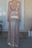 I originally bought a size medium as a sample to try on for my bridesmaids dresses to see if I liked it before I purchased all 5. (Usually I'm a small) and the medium fit me perfectly. It is lined with stretchy material so you can definitely get low and sit no problem. Needless to say I went ahead and ordered the rest of my bridesmaid dresses and tried on one of the smalls, just for curiosity, and It was too tight on me. If your thinking of this purchase Definently order a size up. I ordered a size up from what the chart recc for each of my girls and it fit them perfectly. - Jenny F.