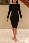 I bought this dress because of the photos and the reviews and I've always wanted an open back dress. I agree with other reviews: the back does not go as low as the photo looks, which I like. The side zipper helps with getting it on and off, but mine causes some bunching on that side. It is not ideal but I'm OK with it! Overall, it is a nice dress! - Catherine N.