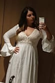 The dress came so fast and fits like a glove! The skirt has two layers and is not see-through in the slightest. I will be wearing this for my bridal shower in August and my only worry is that it's a bit too heavy for a summer event, but otherwise it's a beautiful dress. If I was having a smaller, more intimate wedding this would probably be my wedding dress. - Vanessa C.