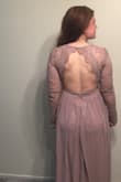 The medium size fits my waist perfectly, but the arms and dress length are pretty big on me. I'll probably need to take about six inches off and it'll be perfect for me. The lace is pretty soft and dress is comfy. I love it though!
My only complaint is that I don't know if it works with my complexion, which is nobody' fault. I might exchange for a more flattering color on me. I want to wear it for my engagement photos in October. - Anna M.