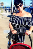 Great fit! Waist and shoulders have stretch and shoulders stay put. Cool fabric for a hot day at the beach. Can be dressed up or down. Good length too, I am tall and no cheek exposure. - Kecia L.