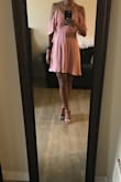 Wearing this dress to a wedding and it fits great! It's a bit low cut but you are able to adjust the straps which helps. Love the color and it is a perfect length. - Johanna C.