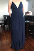 This dress fits so well. Cinched my waist in the right place! Only complaint is -the straps are a little rough and could end up giving you a rash. But with the price of the dress getting that fixed is fine. I'm sure a tailor could add a better strap. - Natalie D.