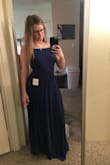 Bought this dress for a friend's beach wedding and it looks great. The extra material on bottom makes it flowy and fun! It does run very long, I had to get it tailored about 3-4" even to wear with wedges. Waist fits perfect and is stretchy, and the adjustable straps make it good for any chest size. I purchased a sticky bra to wear underneath. Picture is pre-alterations/no bra/high wedges on. - Amanda B.