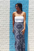 I usually have a difficult time with tube tops because they tend to slide down a lot. But this top is so perfect, it fits so well and doesn't slip down at all. Love love love. I'm ordering one in black as well! - Amanda C.