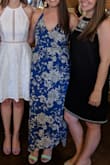 Got this dress for a bridal shower and it was perfect. I am normally a medium (6) in dresses but I ordered a small in this based on reviews. I am glad I did because the top area fit much better than I imagine a medium would. The top still wasn't tight but I don't think that's how the dress is supposed to look. It looked and felt great with a bralette. There was beautiful flow to the dress and I was comfortable. I love the side slits. The color was also gorgeous and I got a ton of compliments. - Erin M.