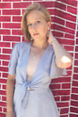This dress is lightweight and perfect for summer! The sky blue and deep-v neckline are very flattering. This dress fits true to size and comes to about mid-thigh. Pair it with some statement earrings and wedges and you'll be ready to take on a summer day! - Samantha B.