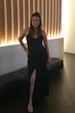 I purchased this dress to wear at as a bridesmaid in my friend's wedding. I got a ton of compliments. It fit well for the most part. I had to get the straps shortened a bit and it fit a little big in the chest. I feel like a small would've been uncomfortably tight though. It photographed nicely and I'd wear it again to another event for sure. - Jami A.