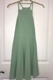 Great dress, but the color is more of a sea foam and not really sage. The picture online is a little misleading, it's much lighter in person. Tried to capture the color myself, but it is hard to photograph. It fits really well, is cute and comfortable. - Isabella B.