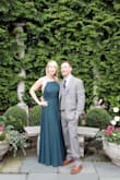 I bought this dress for a wedding and fell in love instantly. The back is simple and beautiful. The cut is very flattering. I received so many compliments. I ordered a medium. At 5'8" I'm always nervous when ordering a long dress that it won't be long enough. However, in this case, I actually had to have the dress hemmed because it was too long. I could've gotten away with wearing a higher heel, but I already had my shoes picked out. It was worth every penny spent. - Maureen M.
