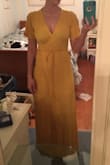 I ordered an XS, and the torso is so short to this dress. The fabric is also very cheap-looking. It's not as it looks in the picture on the model (of course). It's very thin and sheer, and wrinkles very easily. I'm not a fan. I sent this dress back. - Courtney R.