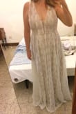 When I go shopping I usually get a large, but I bought an extra large because I live in Italy and didn't want to have to return it because it was too small. Fortunately, I don't need to make any revisions to the top part (unless I lose some more weight). The dress is too long, but I expected that based on the reviews. It is super beautiful and elegant. I'll be wearing it for an intimate wedding ceremony with family. Also, I only paid 15 dollars in shipping and 29 euros for duties. Love this dress! I'm sooooo freakin' happy it worked out!!! - Mallory H.