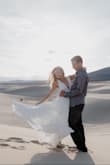 I purchased this dress to wear for our engagement pictures because it was white and had a slit. But when it arrived and I put it on, I felt amazing in it! The straps were a little long so I had them hemmed to hold the girls in better and it was long for my short body but that didn't matter because of the setting it was used in. It's fantastic quality and looks far more expensive that it is! - Kristin P.