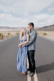 I purchased this dress for our engagement pics and it was stunning. I loved that it was a wrap dress so I could adjust the size. The slit does come up pretty far so that's something to consider. It's a lovely material that's lightweight, perfect for a tropical setting. Humidity would be this dress' bff because it does tend to wrinkle easy. I wore it in a dry climate and once it wrinkled, the lines didn't soften. The periwinkle was beautiful and the quality of the dress is amazing. Give it a try and you won't be disappointed! - Kristin P.