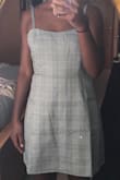 This dress fits well. I sized up after reading the comments (I usually wear a medium) and don't regret my decision. The armpit fits a little large but it is nothing that can't be fixed by safety pins or some quick stitches! - Nya H.
