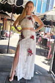 This dress looks amazing even on the curvier girls! I do not have a "small" waist but I was able to pull this cute, trendy, crop top dress off with flare! The only thing I would say is there are a lot of little threads hanging off the flower appliques but those can be easily trimmed. It is also incredibly long so plan on really tall heels or get it hemmed. SLAY, GIRLS! Rock this dress! - Jeanette W.