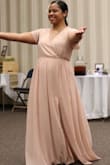 I paid for early shipping and it came on time. It was perfect. Wore this for a bridesmaid dress and the bride loved it. I ordered a Medium and it fit everywhere perfectly except the chest area was a little too revealing for my taste so I sewed it up. It was really long but I didn't hem it. I probably will for the next time that I wear it. - Nolini M.