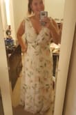 The dress kind of made me look like I had saggy breasts in the front but the back was super cute! - Andrea F.