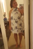 This dress was cute but it didn't seem like the flowers looked good on this dress. The facility was nice but I just didn't like it too much. - Andrea F.