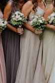 I bought this dress for one on my bridesmaids in my wedding. The purple color of this dress is great, and it fit great on her. The only thing is that it's a little too low in front. She had to have it sewn together a little so it wasn't as low, but everything else was great! - Darci D.