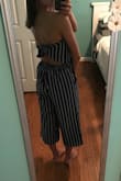 I really love this jumpsuit! I bought it to go out to dinner and it is perfect to dress up or dress down and wear casually. I'm pretty short so it's a little longer on me than the model but still looks great. I got lots of compliments. Additionally....it has pockets!! - Bryelle C.