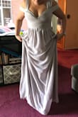 The dress is just perfect! Perfect color and size. I bought this as a bridesmaid dress and it's really a good quality dress. The only thing is that you will more than likely have to have it hemmed BC it's literally 8 inches too long (which I knew when I bought it). - Elaina T.
