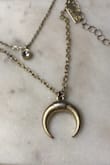 I was super excited for this necklace. With its simplicity & boho vibes I figured it would be a huge staple piece that I'd get a lot of wear out of. But, when I opened the package I was really underwhelmed by the quality of it. For $20 I wasn't expecting high end quality but more something a notch above. This disappointed me, but what disappointed me even more was that after only two wears the gold has begun to wear off and show silver on both the pendant & the chain. - Heather P.