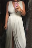 I cannot believe how flattering this dress is! I was worried that the small would be too small but it fits perfectly! I am on the shorter side so the top is a little looser but it's still beautiful - Ashley C.
