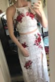 This is much more beautiful in person than it shows online. I got this to wear for my engagement photos. It's a bit snug but not enough to size up. I can't wait to wear it! - Elayna P.