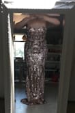 This dress fits like a glove! The stretchy material hugs all the right spaces. I will be wearing this to my wedding after party! I had to get the bottom hemmed a few inches, but once that was done, it is perfect. Takes two people to zip up though! - Katy G.