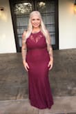 This dress was beautiful and fit perfectly.  I wore it to my best friends wedding. I'm usually about a size 10 and I ordered a large and it fit amazing and hugged my curves beautifully. It is long but I'm short so that's normal I wore a 5inch heel. Not a lot of stretch. Made well. The color is more in the darker purple/red/burgundy's. Truly a stunning dress. - Crystal