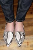 The fit is perfect, definitely has room to stretch too. It's soft material so it doesn't feel like it's digging in anywhere.  Perfect for work or dressing up an outfit. 
People are always asking me if it's real snake skin. I don't tell them it's knockoff! - Deven H.