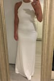 The material of this dress is stretchy and thick so it falls beautifully. It fits me perfectly below the bust but I'll need to have it taken in at the top slightly. A very flattering fit and overall beautiful gown at an affordable cost. Thanks lulus! - Lindsay A.