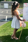I really never write reviews on things but I was just so impressed with the quality of this dress! I was scared to order a dress online because I am on the shorter side and usually have to find dresses in petite sizes. This dress fit perfectly and the straps were adjustable to make it shorter/longer including the neck line. I got so many compliments on it! It was the perfect dress for this occasion. The fabric itself is pretty thick so you're probably safe without a bra but to be on the safe side I used cups instead ;) 

I hope this helps! - Dianne A.