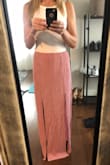 This skirt is beautiful! Originally I was going to order a small, but it was sold out. I couldn't wait any longer so I decided to try the XS. I'm glad I did, it fits perfect. I am 5'6 and the length (to me) is perfect. I despise when my maxis/skirts don't touch the ground lol. The elastic at the top isn't too tight either and won't give you a muffin top. Overall a great buy! - Jordan N.