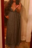 I'm a petite dame who LOVES maxi dresses. And yes, majority of the time I do have to get them fixed up. So with that being said--yes this dress is very long, and I have been holding it up when I walk (kinda makes me feel like a bit of classic grace with it). It's incredibly very light, and not wearing a bra or pasties with this really makes this dress incredibly comfortable. Occasionally, I do have to  adjust the boob area to make sure the girls are not peaking through, but nevertheless--LOVE this dress! - Maria L.