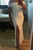 I am absolutely in love with this dress for my court wedding. I am 5 foot eight originally bought it in a size large but I'm also overweight right now and had to return it and get an extra larger. the material is super stretchy and extremely fitting to any body type. I love it,I would recommend this:) - Renate B.