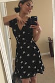 Love this little black number I got! So happy I got it when it was on sale. It's very soft and you will have to make sure it's tied just right for you. Had to securely tighten it since was afraid would show a little too much LOL. Overall loved it would definitely want it in white next time! - Cristina G.