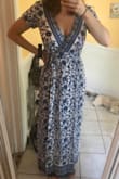 I really love this dress. It's light material, so it will be comfortable in warmer weather. It's easy to put on since it's a wrap dress. Colors are pretty. It's a little long to just wear with flip flops, but pairs nicely with some wedges. Would definitely recommend. - Sierra K.