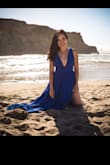 This dress is amazing. Looks so pretty on. It was a tad tight in the chest area but otherwise the fit is true to size. I wore it to the beach and got so many compliments on the picture that I took with it. The blue is a gorgeous color and really pops out in the picture! - Linh V.