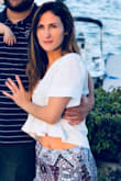 I love this shirt! It is perfect for the beach. It's light and keeps you cool on hot summer outings. - Kate