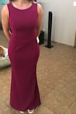 I love this dress so much! I bought it for a black tie wedding and I never want to take it off. The material is thick, but not too heavy, and I can tell it's good quality. I love the stretch that it has and it shows off curves in all the right places. I am choosing not to wear a bra with it because the material is thick and I don't see it being an issue. I got the large and it's a little long without heels on. Also the color is very flattering. I will definitely keep Lulus in mind for future purchases. - Becca J.
