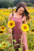 Very soft, comfortable, and flattering! Looks super cute with platform espadrilles. I wore a bralette under it since the arm holes go a little low. Really glad I got it! - Dana M.