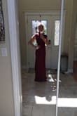 The quality of this dress is excellent. Material isn't too thick or too thick I'm wearing it as a bridesmaid dress and it's super classy. Colour is exact same as picture. I need a slight hem at the bottom. I'm 5'5". Size medium. 127 pounds. - Lori J.