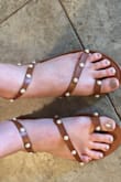 These are cute and good for the sale price but aren't the best quality. The ankle strap is super tight (and i have skinny feet and ankles) so definitely go up one full size. I am a size 7 and got a 7 and a half but wish i got an 8. - Kassi P.