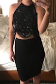This halter is so fun and beautiful. It's very sparkly, but does not irritate the skin like other sequin pieces I've had. I felt secure in the chest and covered. I paired it with a high waisted pencil skirt and got so many compliments being out! - Megan B.